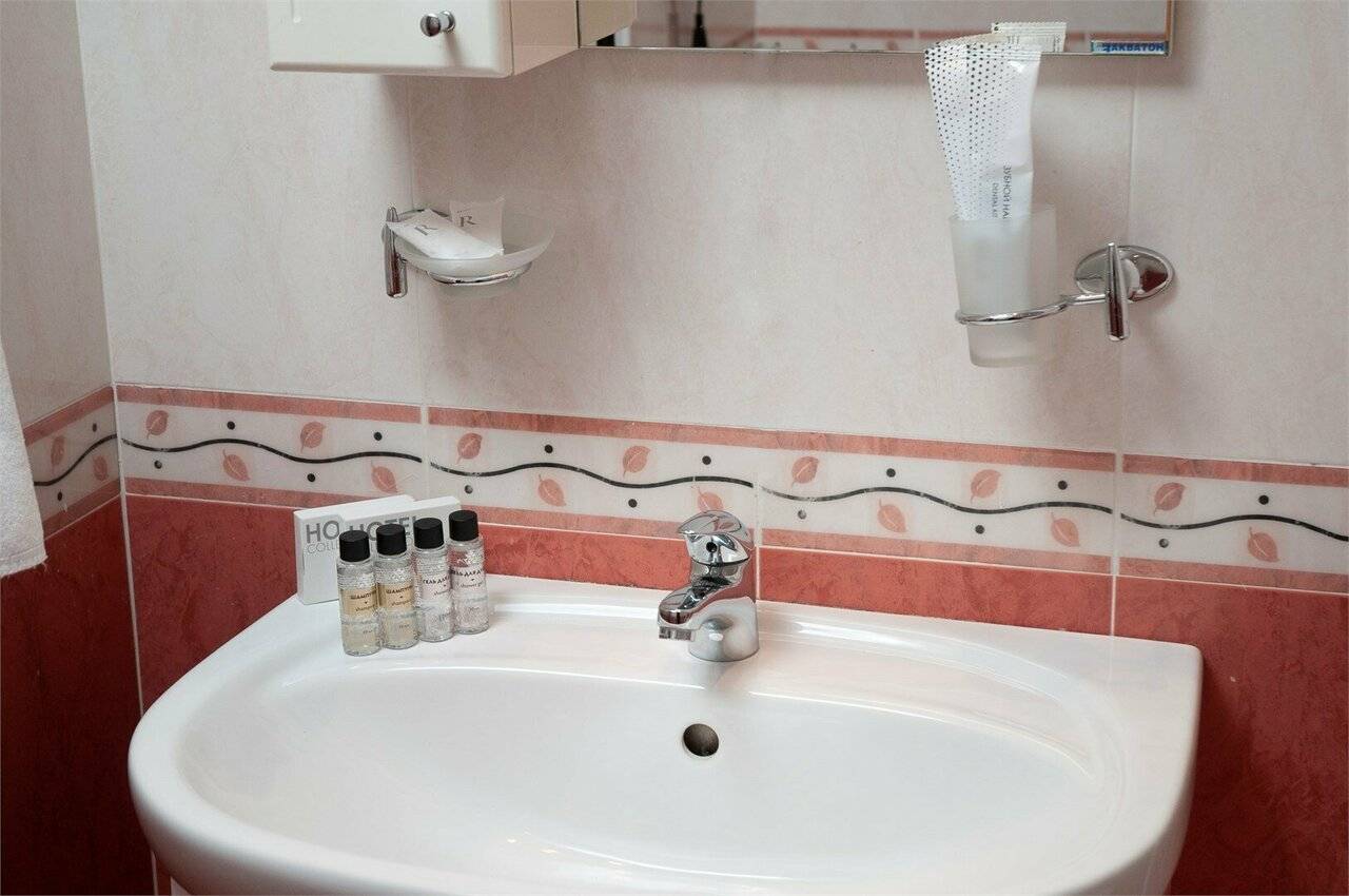 Фотографии номера Комфорт двухместный номер с двумя кроватями в Гостинице Историческая гостиница Калуга Калуга