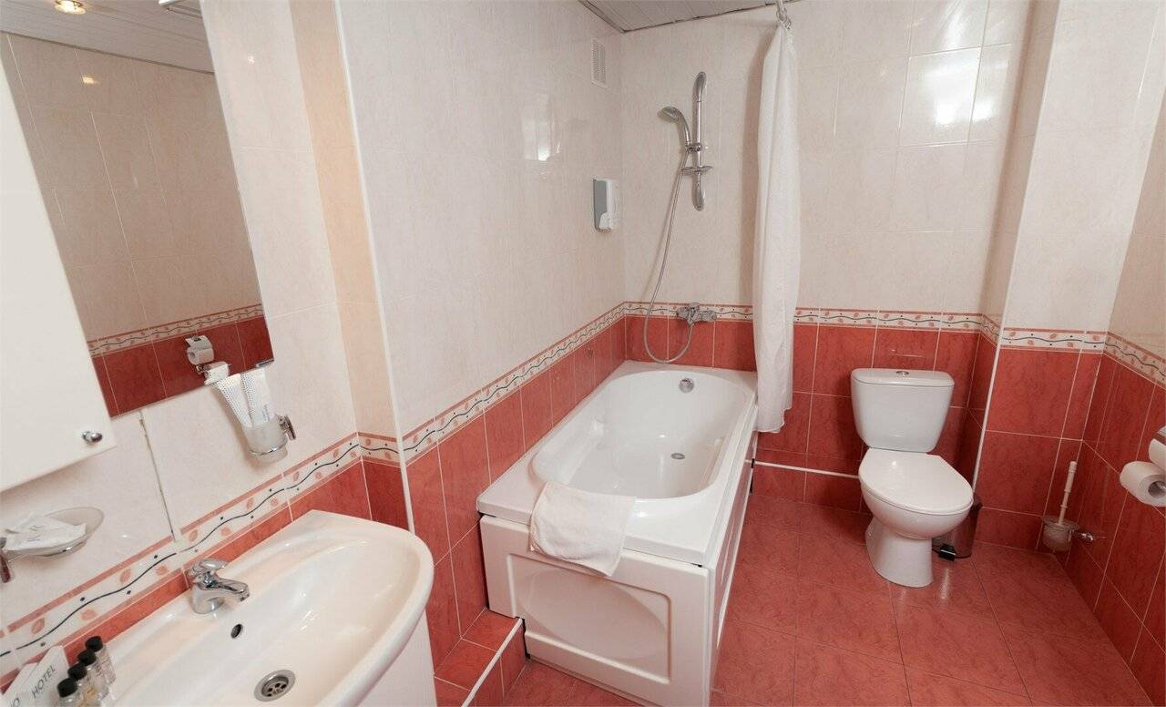 Фотографии номера Комфорт двухместный номер с двумя кроватями в Гостинице Историческая гостиница Калуга Калуга